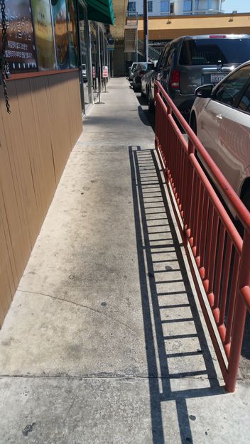 The picture shows one mall on Vermont Avenue’s organized setup to accommodate the disabled. On the contrary, the photo below shows a setting at another property that does not provide as much accommodation for the disabled. The photos are not directly related to specific businesses.