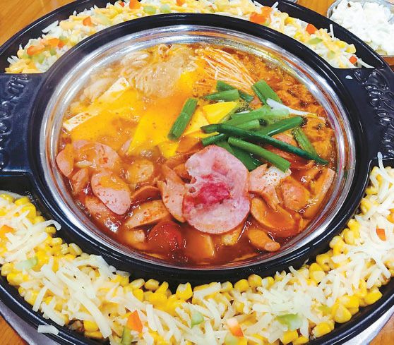 Budae jjigae with sweet corn side