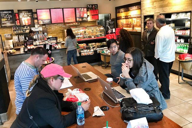 Coffee shops in Koreatown rake in the most number of customers before and after an average people’s work hours. A customer is at Koreatown coffee shop on Wilshire Boulevard on Dec. 12 at 3 p.m. with a laptop. 